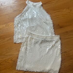 An adorable two piece for any future bride or someone who loves white outfits!